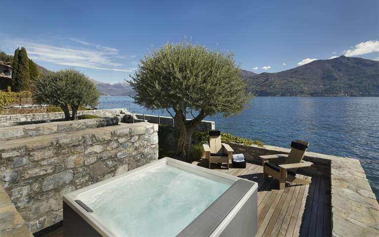 outdoor Jacuzzi with lake view