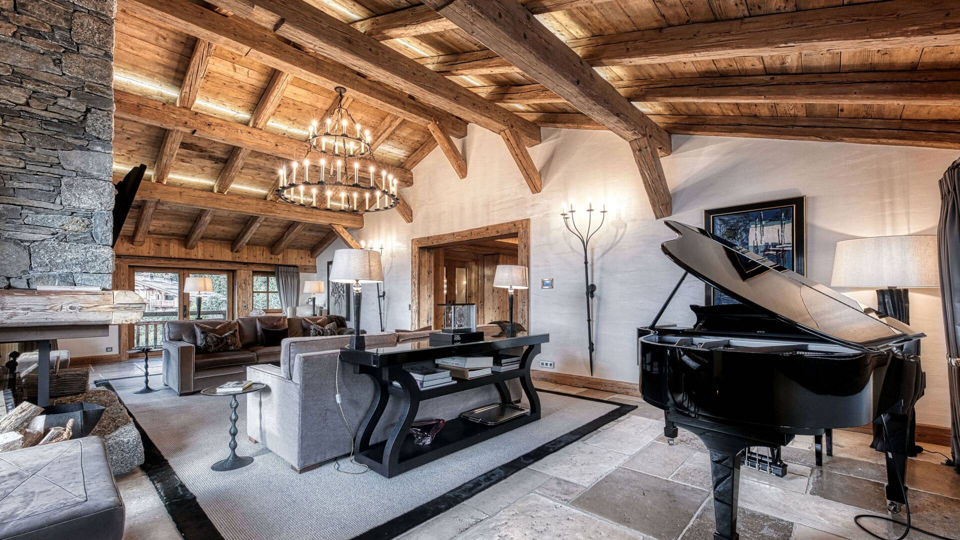 large living room with fireplace and piano