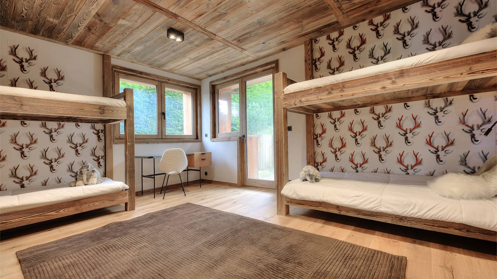 quadruple bedroom with 2 sets of bunk beds