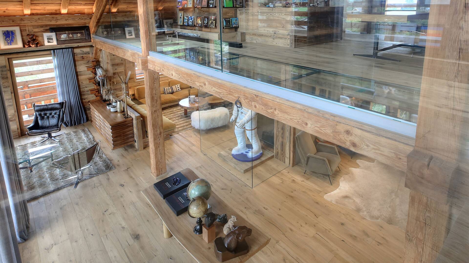 mezzanine floor with glass floors and view over the main living room