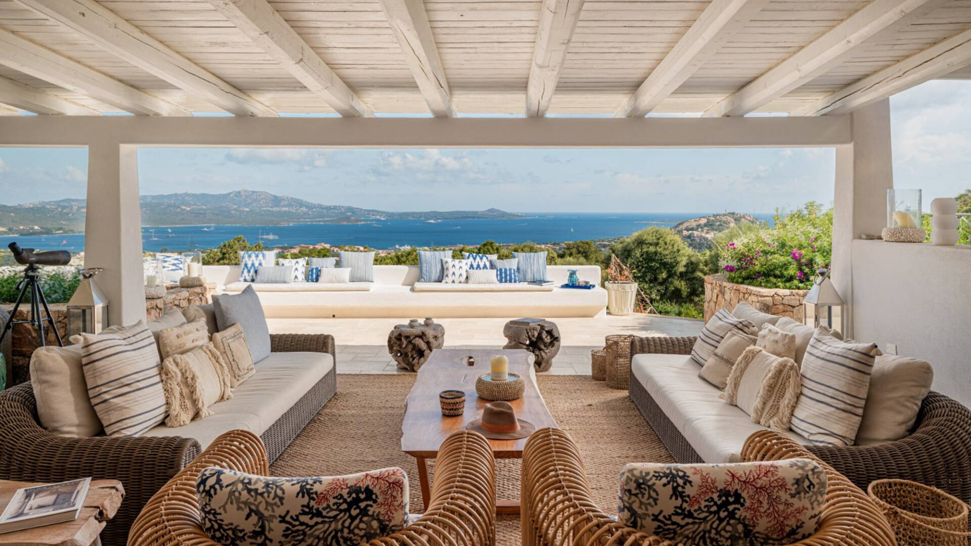 covered terrace with sofas and sea view