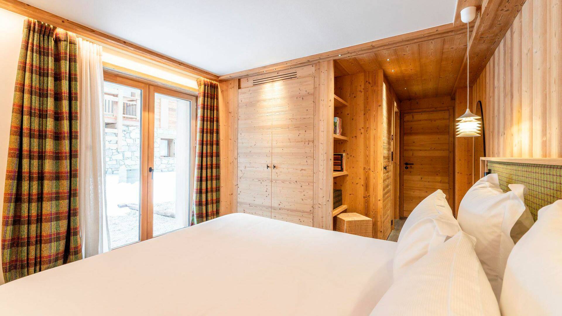 en suite double bedroom with outdoor access