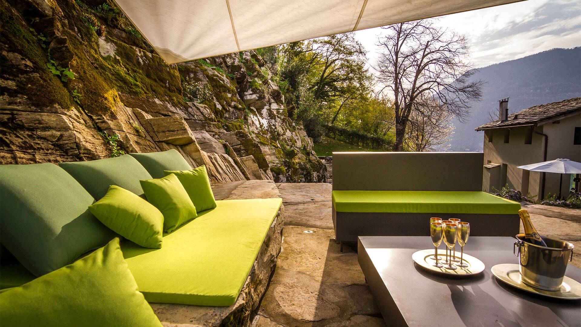 covered outdoor sitting area with sweeping views of Lake Como