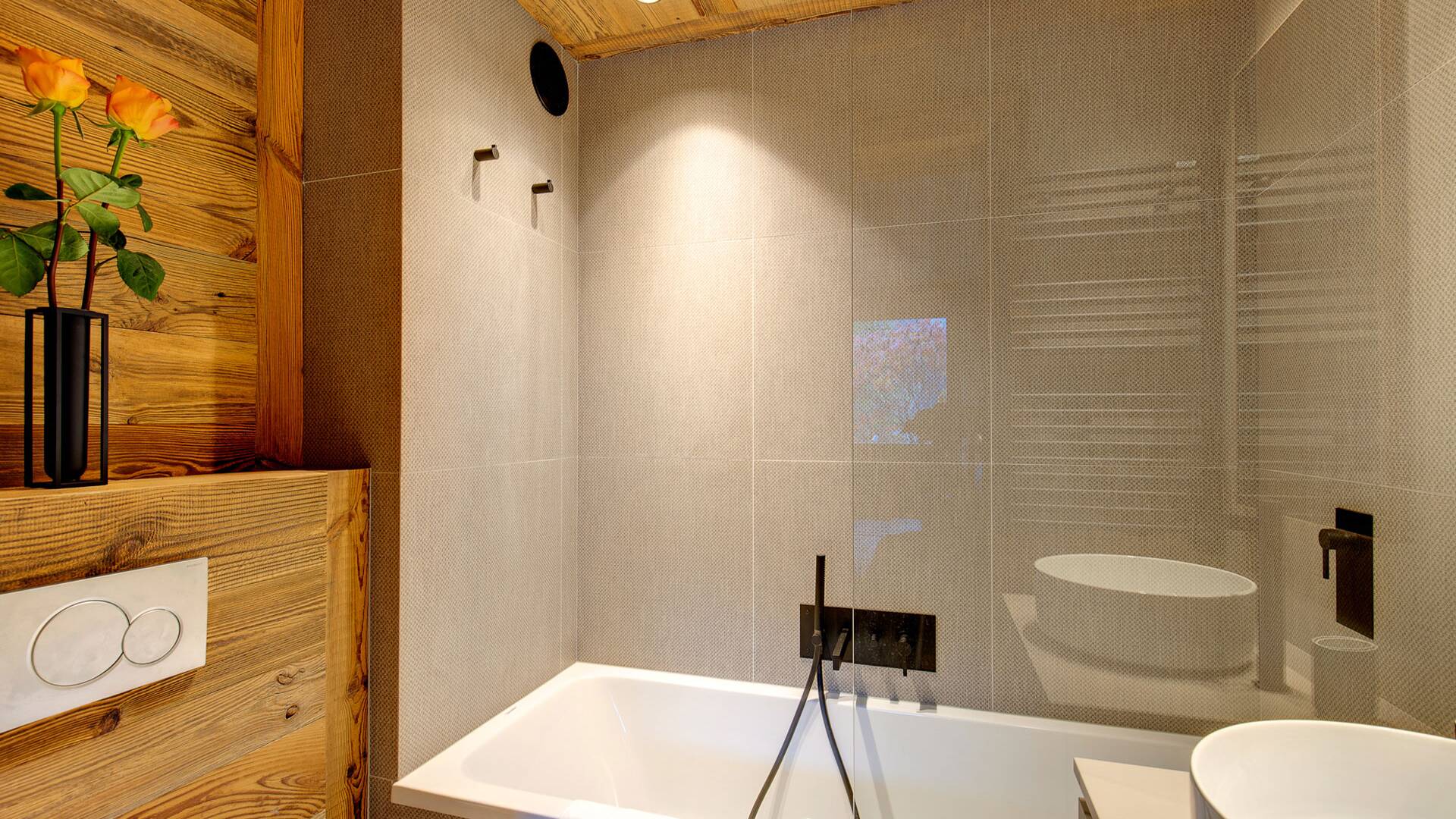 en suite bathroom with bath tub