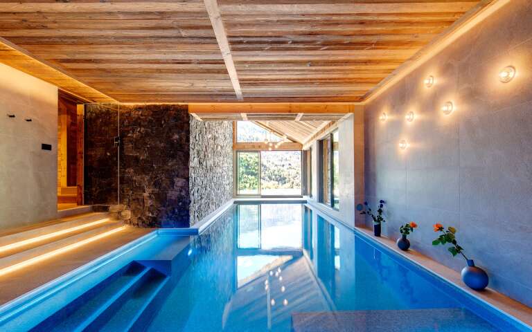 luxury indoor pool with direct access to outdoor