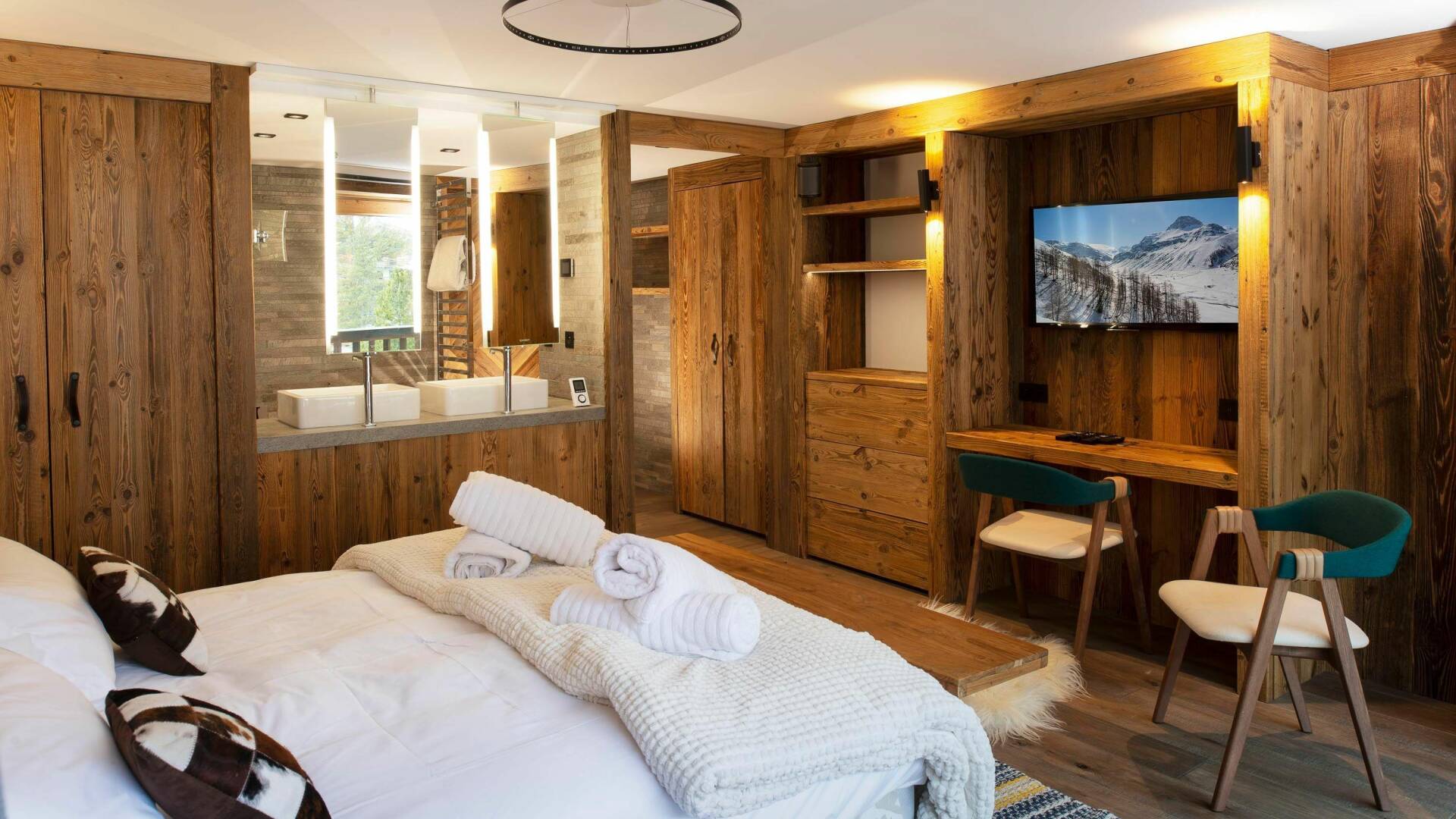 luxury double bedroom with TV