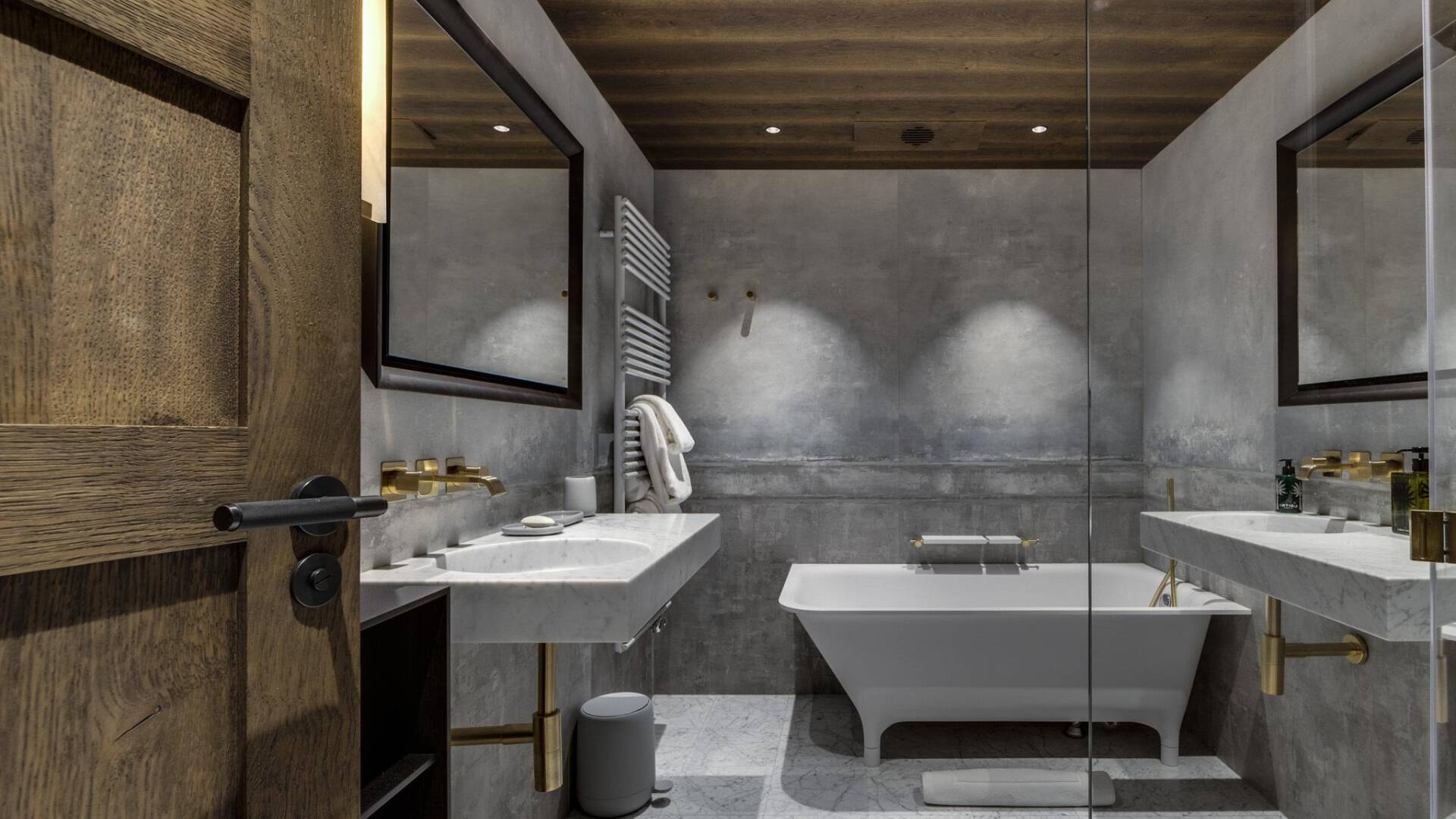 en suite marble bathroom with double lavabo
