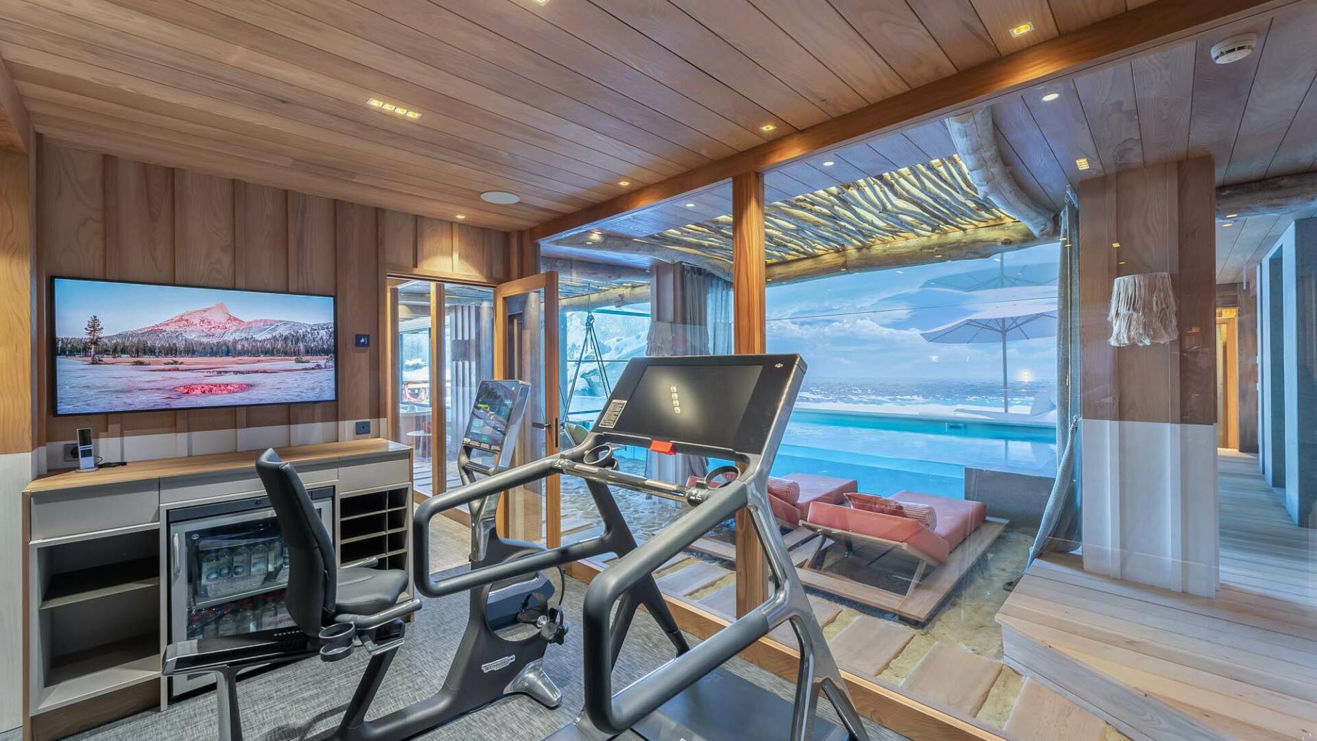 fully-equipped gym nearby indoor/outdoor heated pool