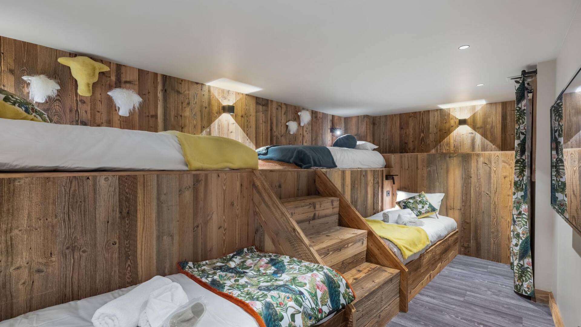 quadruple bedroom with 2 sets of bunk beds