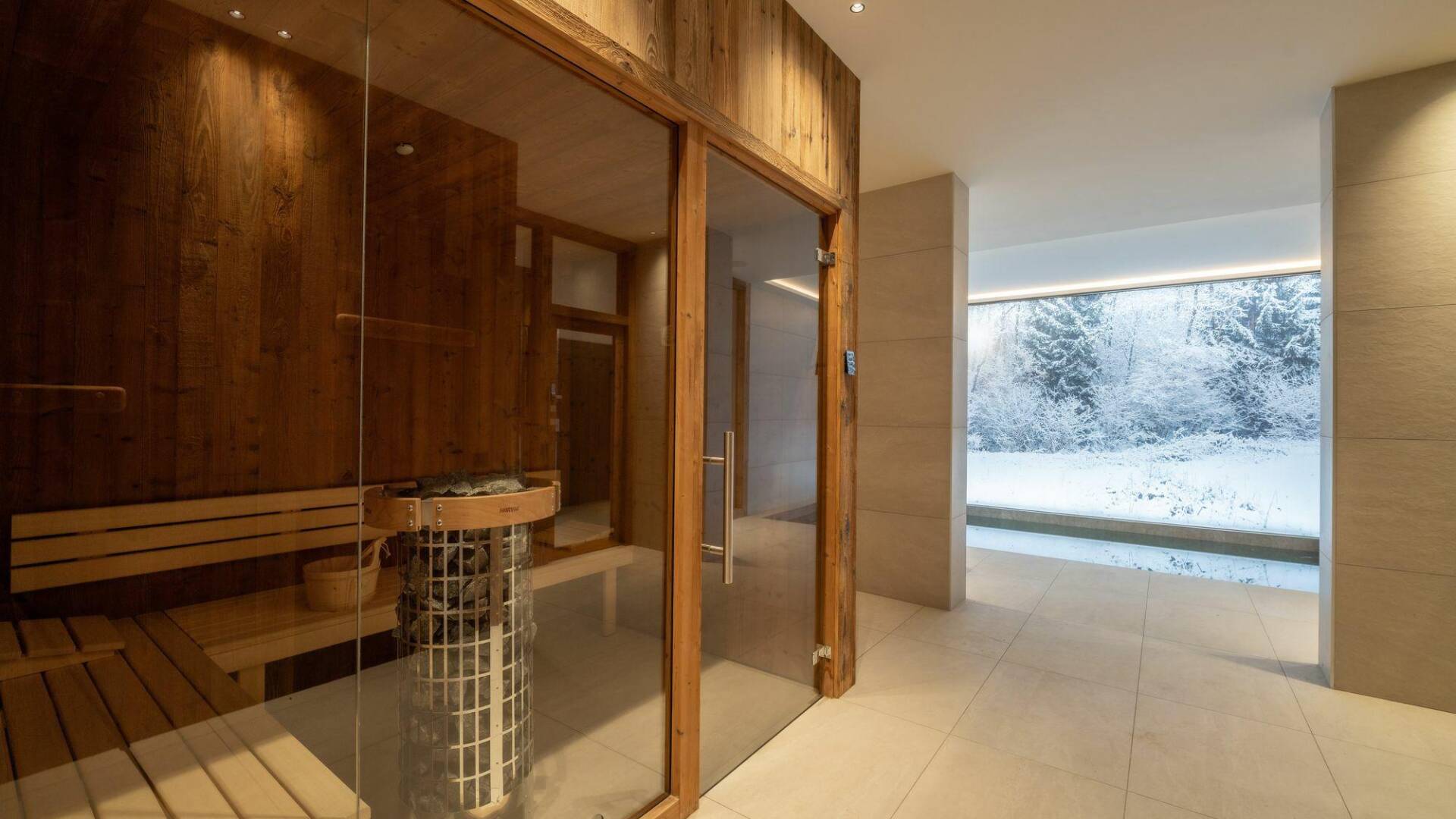 private wellness area with sauna and indoor pool