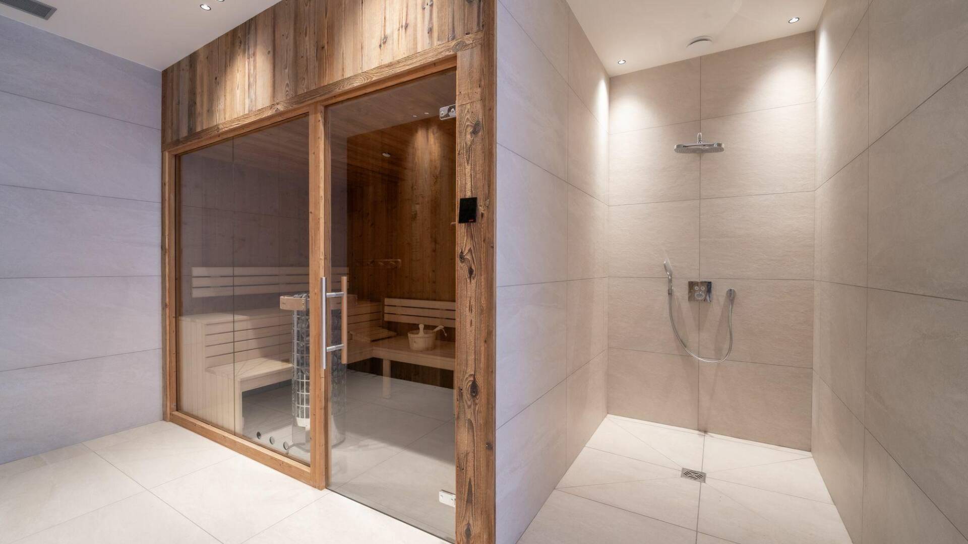 wooden sauna and walk-in shower