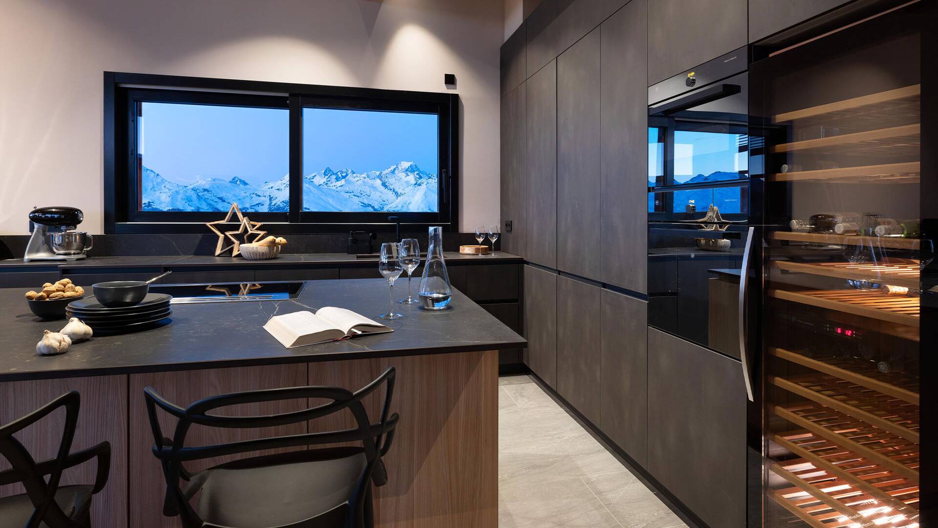 gourmet kitchen with counter and stools