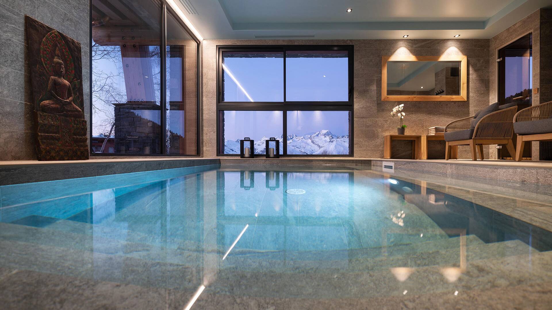luxury indoor pool with breathtaking view of French Alps